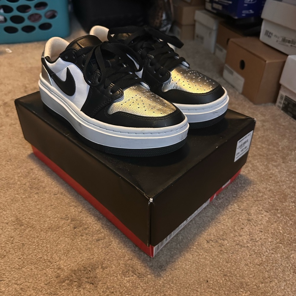 Jordan Women’s Black and Silver Sneakers
